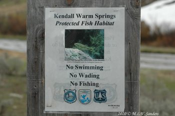 Sign with restrictions to protect endangered fish habitat posted at Kendall Warm Springs
