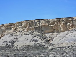 To our right was the ridge we were climbing. The top layer of rocks looked wafer thin.